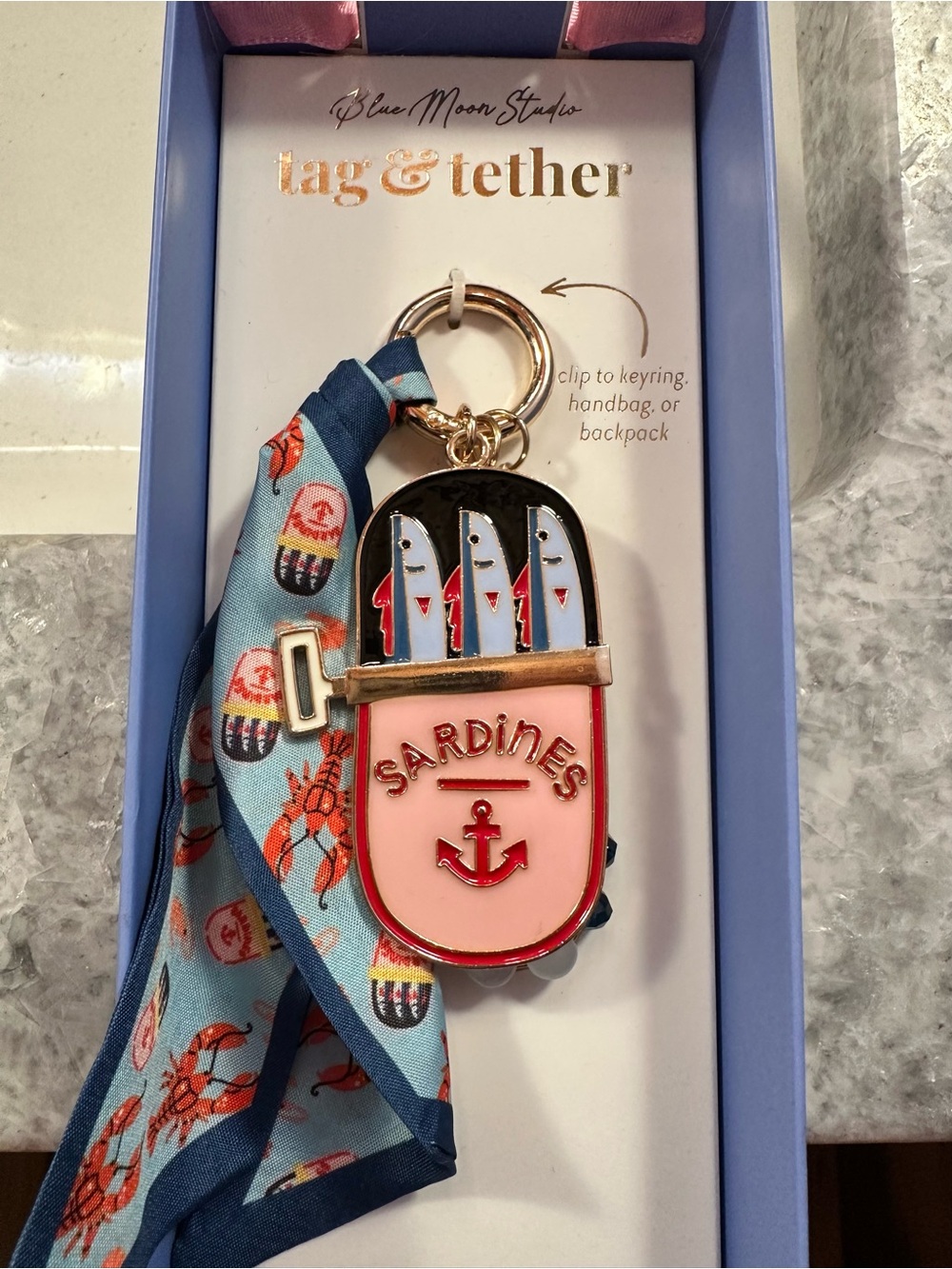 🐟 If you love the fun of sardines in fashion, then this purse charm is for you!
